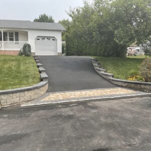 Asphalt Driveway With New Wall in Kings Park, NY